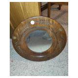 Oval wood framed mirror