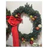 Large lighted Christmas wreath with balls and