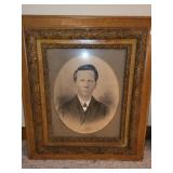 Wooden carved frame with picture of successful,