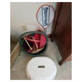 Baskets, tennis racket, plastic stool