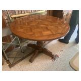 Round adjustable height table from Gertz