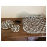 Glass platter with three flower frogs