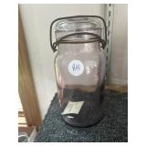 Purple Fruit Jar with 2 TF mark on bottom.