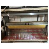 General store paper roller