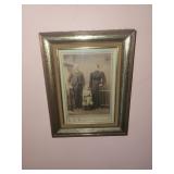 Eary Photograph of parents & little girl by