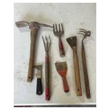 Pick axe and various handheld tools