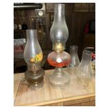 2 Oil lamp and chimneys - one is handle lamp