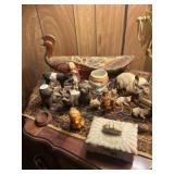 Several animal figurines: cats, dogs, Peacock,