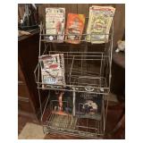 Metal magazine, display, and several magazines