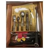 Several drawers, full of silverware, kitchen,