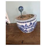 Blue and white planter with blue water deal