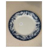 Blue and white platter chipped on back
