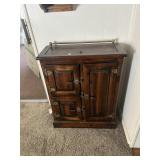 Wooden bar cabinet and contents