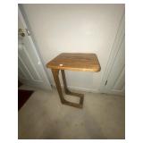 Oak side table and Black & Decker portable sweeper