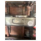 Steel pan with wrenches and hammer