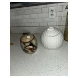 Snowman and golf ball cookie jars