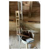 Two levels and bucket of misc. tools