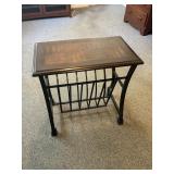 Metal based magazine rack table