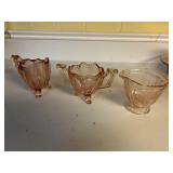 Pink depression creamers and sugar