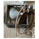 Milk crate of copper tubing, funnel and tools