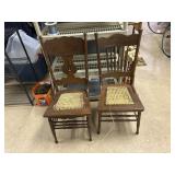 Two Cain bottom chairs