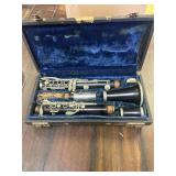 Vintage wooden clarinet in case