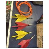 Lawn Darts - 2 red, 2 yellow and 2 plastic rings.