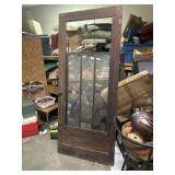Wooden screen door and storm doors