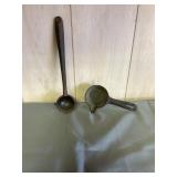 2 cast iron ladels