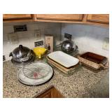 Assorted pans and kitchenware Assorted pans and kitchenware
