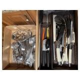 Knives and assorted silverware Knives and assorted silverware