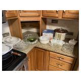 Assorted kitchen ware and crock pots Assorted kitchen ware and crock pots