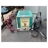 Battery charger and leak gauge
