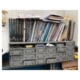 Assorted bolts,nuts, screws, books