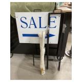 Sale signs and blank banner