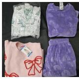 Girl's size 10/12 sweater and pajama sets. Most