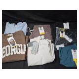 Women's size Medium sweatshirts, snow pants and