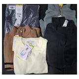 Women's size Medium sweaters and shirts. Most New