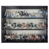 Framed group of W. Britain soldiers and cavalry