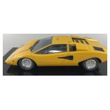 1:18 scale model of a yellow Lamborghini Countach