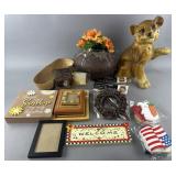 Group of decorative accessories: lion figure,