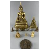 Group of oriental figures and medallion, 1'-12'