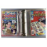 32 vintage Archie Comics in binder: Archie's