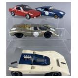 4 plastic replica cars: Chaparral 2E race car,