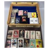 Group of adult playing cards in acrylic display