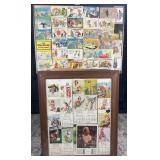 2 framed vintage pin ups and comics, 23' x 36'