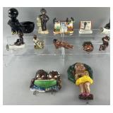 Group of Blackamoor figures, ashtrays and more