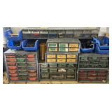 7 storage boxes with an assortment of screws,