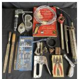 Group of hand tools, grease guns, soldering iron,
