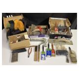 Group of painting supplies and gloves: paint